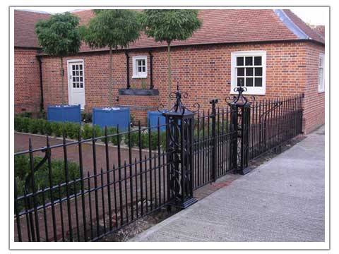 Photo of a courtyard railing and gate