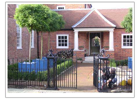 Photo of a courtyard railing and gate